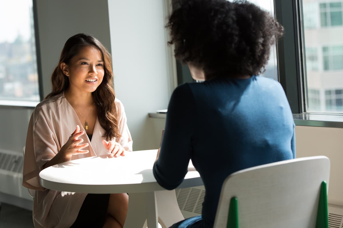 A SMAART Loans advisor in a one-on-one consultation with a client